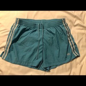 Turquoise colored Old Navy running shorts